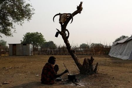 a woman cooks a meal in the town of pibor boma state east of south sudan february 2 2017 photo reuters