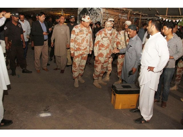 rangers and police personnel inspect the site of cracker explosion at sakhi wahab shah jilani flyover on february 19 2017 photo online rangers and police personnel inspect the site of cracker explosion at sakhi wahab shah jilani flyover on february 19 2017 photo online