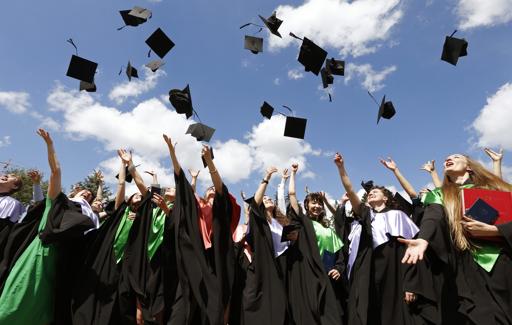 the official photographers have to add the mortarboards in digitally at no extra cost photo reuters