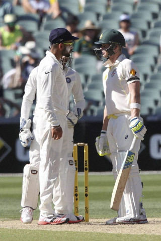 kohli l and smith face off in four test series starting this week photo afp kohli l and smith face off in four test series starting this week photo afp