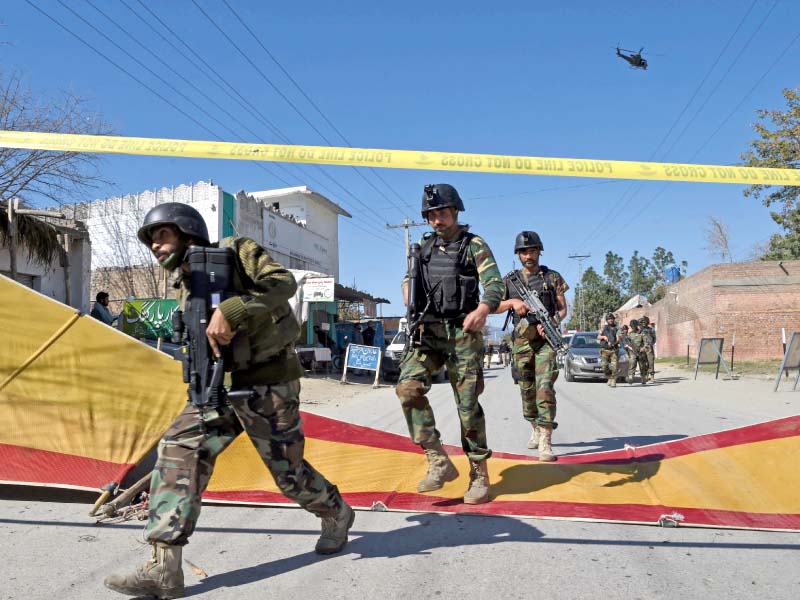 special forces commandos arrive at the targeted courts complex in charsadda photo afp