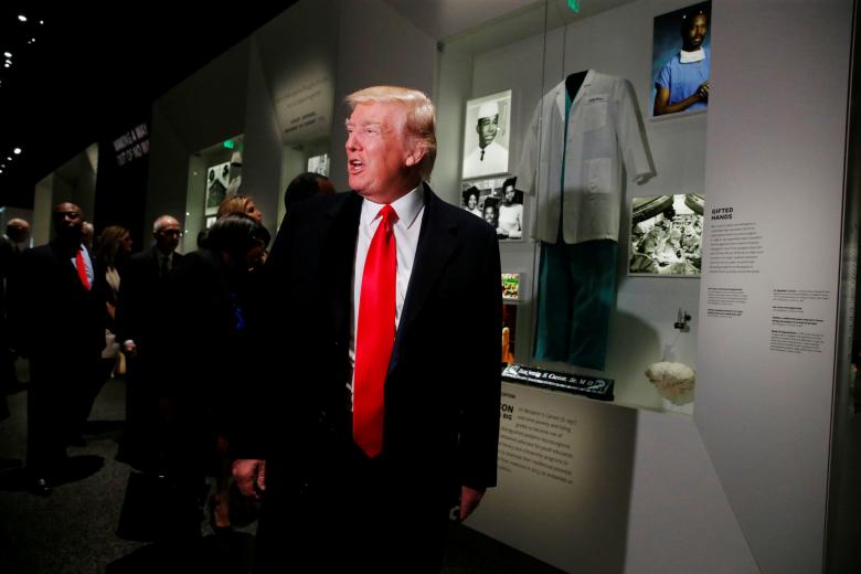 u s president donald trump pauses at the dr ben carson exhibit at the national museum of african american history and culture in washington u s february 21 2017 photo reuters