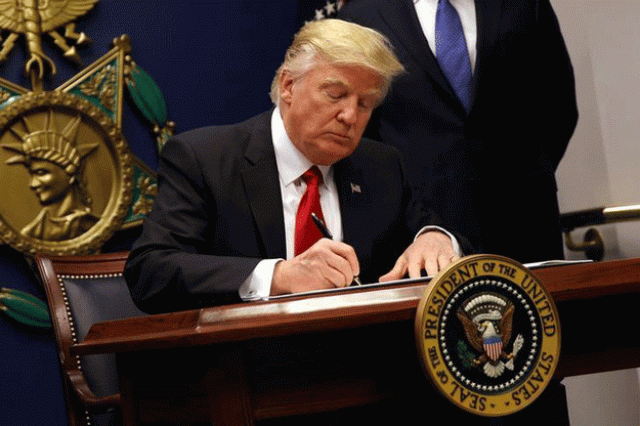 us president donald trump signs an executive order to impose tighter vetting of travelers entering the united states at the pentagon in washington us photo reuters us president donald trump signs an executive order to impose tighter vetting of travelers entering the united states at the pentagon in washington us photo reuters