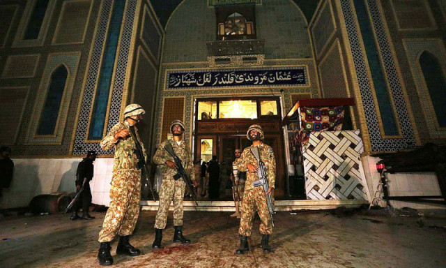 soldiers stand guard outside lal shahbaz qalandar 039 s shrine the shrine was targeted by a suicide bomber on february 16 which claimed over 80 lives photo app soldiers stand guard outside lal shahbaz qalandar 039 s shrine the shrine was targeted by a suicide bomber on february 16 which claimed over 80 lives photo app