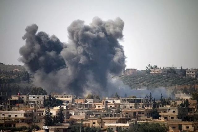 smoke billows in the distance following reported air strikes on the southern syrian city of daraa on february 23 2017 photo afp smoke billows in the distance following reported air strikes on the southern syrian city of daraa on february 23 2017 photo afp