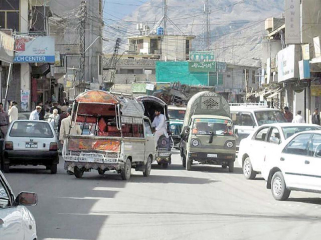 vehicles are stuck on a road in gilgit town photo file vehicles are stuck on a road in gilgit town photo file