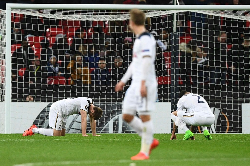 upset pochettino 039 s men slumped to a shock europa league exit as gent 039 s 2 2 draw at wembley gave the unfancied belgians a stunning 3 2 aggregate success in the last 32 second leg photo afp