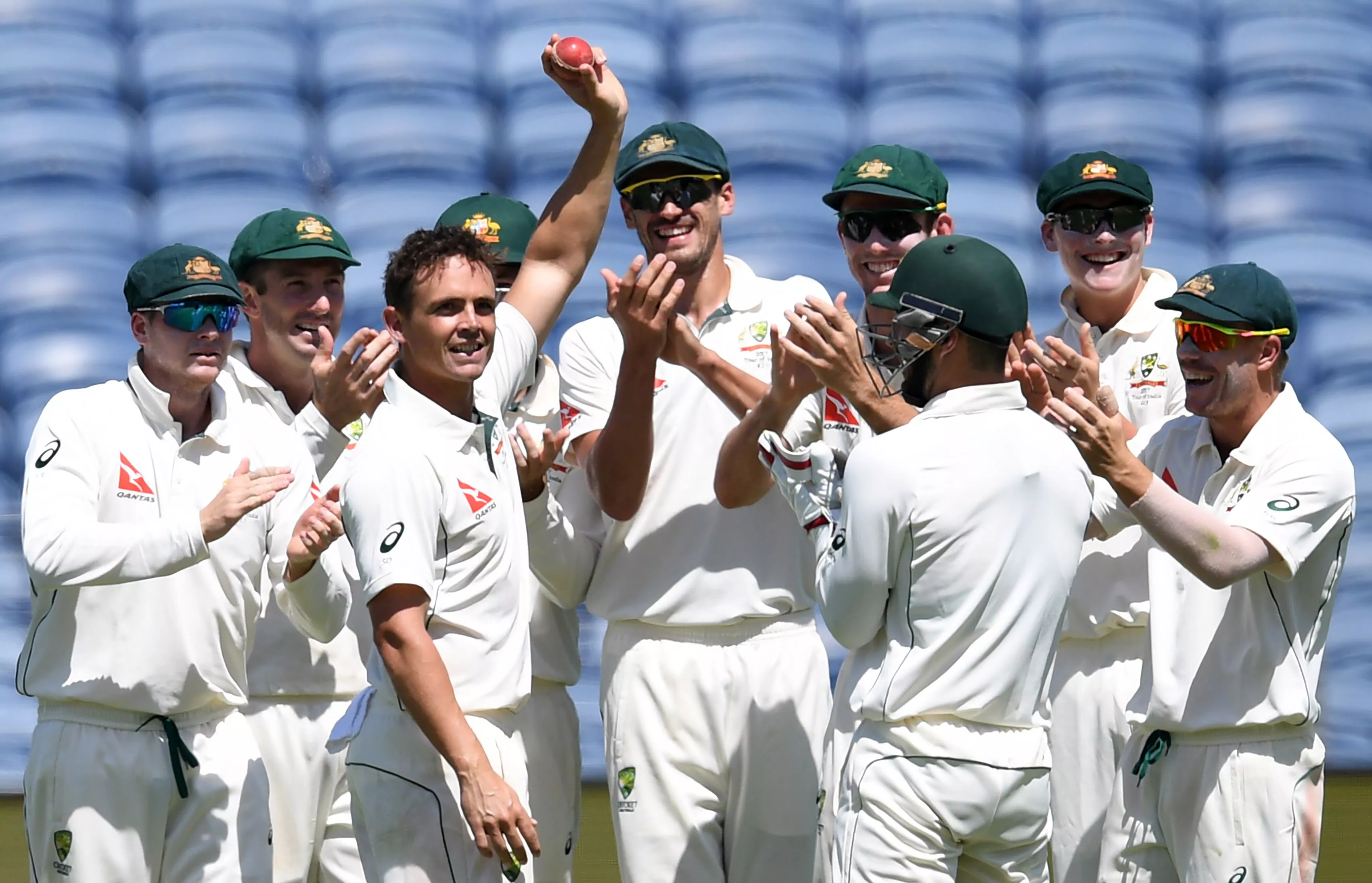 australia 039 s cricketers applaud teammate steve o 039 keefe 3l after he took six wickets in pune on february 24 2017 photo afp australia 039 s cricketers applaud teammate steve o 039 keefe 3l after he took six wickets in pune on february 24 2017 photo afp