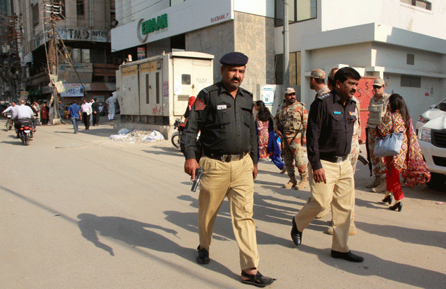 a large contingent of law enforcers immediately reached the site and evacuated the multi storey commercial building hussain centre photo athar khan a large contingent of law enforcers immediately reached the site and evacuated the multi storey commercial building hussain centre photo athar khan