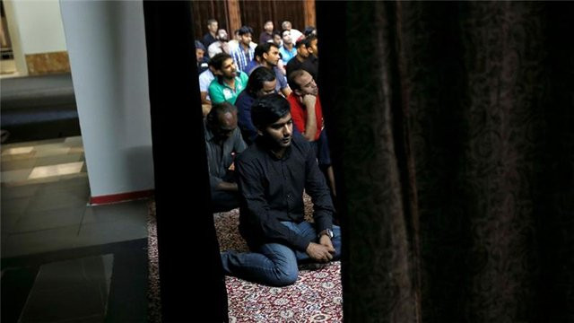 muslims attend eid al fitr prayers at a mosque in a basement to mark the end of ramadan in piraeus photo reuters muslims attend eid al fitr prayers at a mosque in a basement to mark the end of ramadan in piraeus photo reuters