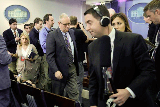 journalists leave after several major news organisations including cnn the new york times and politico were excluded from an off camera 039 gaggle 039 meeting with white house press secretary sean spicer in his office that was held in place of the regular daily press briefing at the white house in washington us february 24 2017 photo reuters