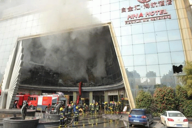 firefighters are seen at the site after a fire broke out at hna hotel in nanchang jiangxi province february 25 2017 photo reuters firefighters are seen at the site after a fire broke out at hna hotel in nanchang jiangxi province february 25 2017 photo reuters