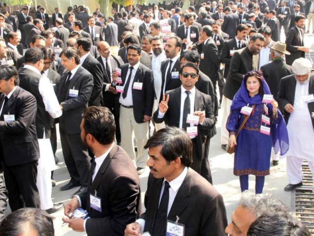 lawyers wait outside the lahore high court building to cast their vote photo abid nawaz express lawyers wait outside the lahore high court building to cast their vote photo abid nawaz express