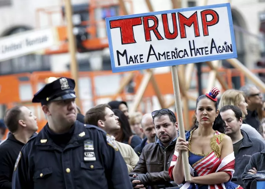 people take part in an anti donald trump pro immigration protest outside photo reuters people take part in an anti donald trump pro immigration protest outside photo reuters