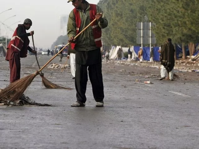 solid waste not collected in abbottabad havelian as workers stage sit in outside offices of tehsil nazim tehsil municipal officers photo reuters solid waste not collected in abbottabad havelian as workers stage sit in outside offices of tehsil nazim tehsil municipal officers photo reuters