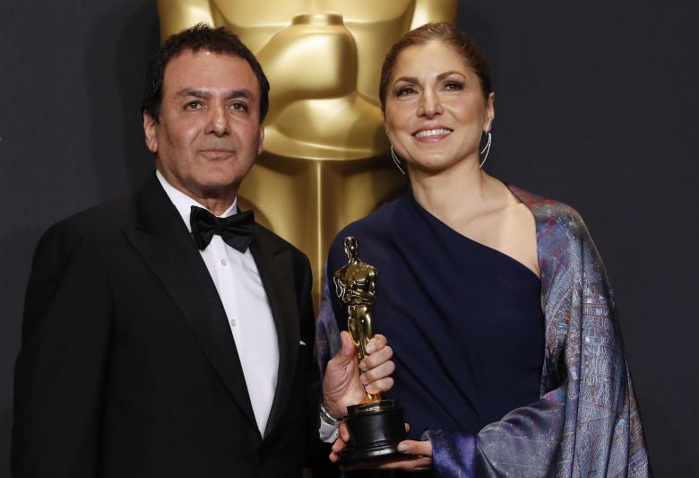 89th academy awards   oscars backstage   hollywood california u s   26 02 17   anousheh ansari and firouz naderi pose with the oscar they accepted on behalf of asghar farhadi who won the best foreign language film for quot the salesman quot photo reuters