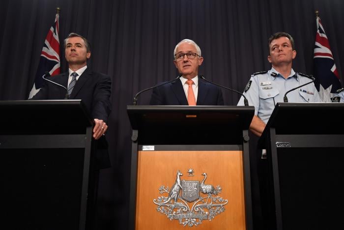 australia 039 s justice minister michael keenan l r prime minister malcolm turnbull and australian federal police commissioner andrew colvin speak during a press conference at parliament house in canberra australia february 28 2017 on a police raid on what they say was a bomb making site in the town of young photo reuters