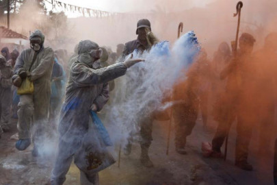flour power lifts spirits as greek village stages mock battle flour power lifts spirits as greek village stages mock battle