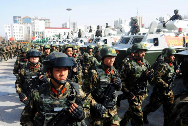paramilitary policemen stand in formation as they take part in an anti terrorism oath taking rally in kashgar xinjiang uighur autonomous region china february 27 2017 photo reuters
