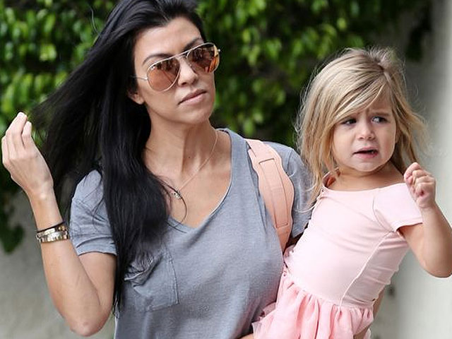 kourtney kardashian called out for letting four year old wear a lip ring