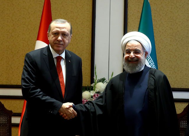 turkey 039 s president tayyip erdogan meets with iranian president hassan rouhani during the 13th economic cooperation organization eco summit in islamabad march 1 2017 photo reuters