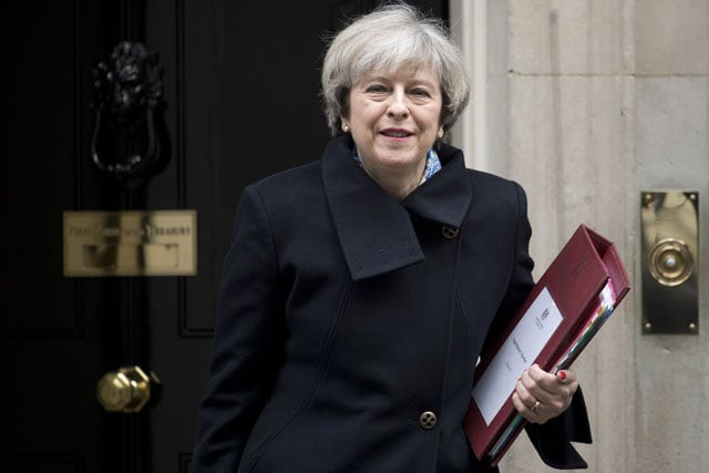 british prime minister theresa may leaves 10 downing street for the weekly prime minister 039 s questions session at the house of commons in central london on march 1 2017 photo afp british prime minister theresa may leaves 10 downing street for the weekly prime minister 039 s questions session at the house of commons in central london on march 1 2017 photo afp