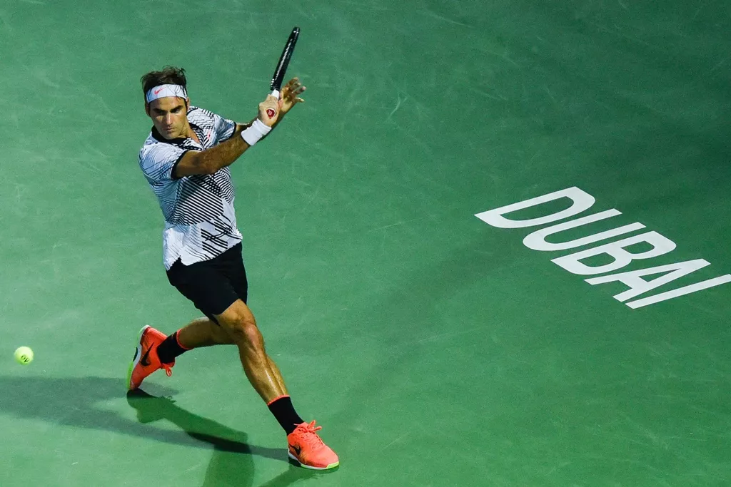 roger federer returns the ball to evgeny donskoy on march 1 2017 in dubai photo afp roger federer returns the ball to evgeny donskoy on march 1 2017 in dubai photo afp