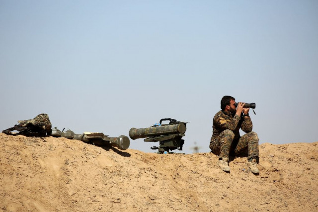 a fighter of the us backed syrian democratic forces sdf made up of an alliance of arab and kurdish fighters looks with binoculars as he sits next to anti tank weapons in the village of sabah al khayr a fighter of the us backed syrian democratic forces sdf made up of an alliance of arab and kurdish fighters looks with binoculars as he sits next to anti tank weapons in the village of sabah al khayr photo afp a fighter of the us backed syrian democratic forces sdf made up of an alliance of arab and kurdish fighters looks with binoculars as he sits next to anti tank weapons in the village of sabah al khayr a fighter of the us backed syrian democratic forces sdf made up of an alliance of arab and kurdish fighters looks with binoculars as he sits next to anti tank weapons in the village of sabah al khayr photo afp
