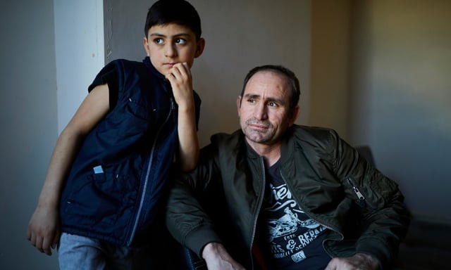 while norzai speaks no english wali who is now enrolled in a british school acts as his interpreter photo the guardian while norzai speaks no english wali who is now enrolled in a british school acts as his interpreter photo the guardian