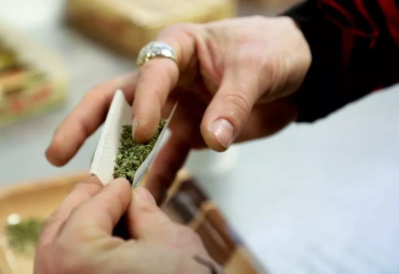 a participant practices rolling a joint at the cannabis carnivalus 4 20 event in seattle washington april 20 2014 photo reuters a participant practices rolling a joint at the cannabis carnivalus 4 20 event in seattle washington april 20 2014 photo reuters