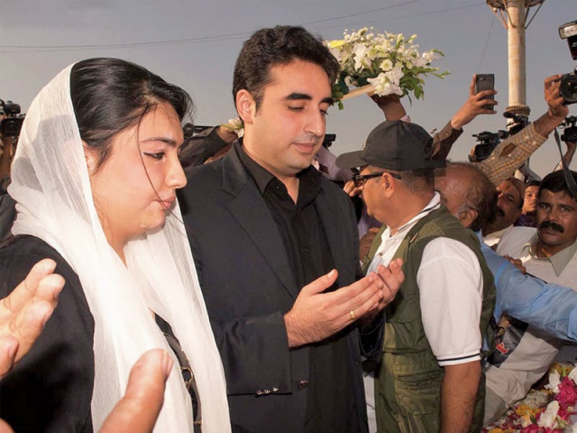 aseefa and bilawal bhutto zardari offer fateha at the karsaz monument in karachi photo online aseefa and bilawal bhutto zardari offer fateha at the karsaz monument in karachi photo online