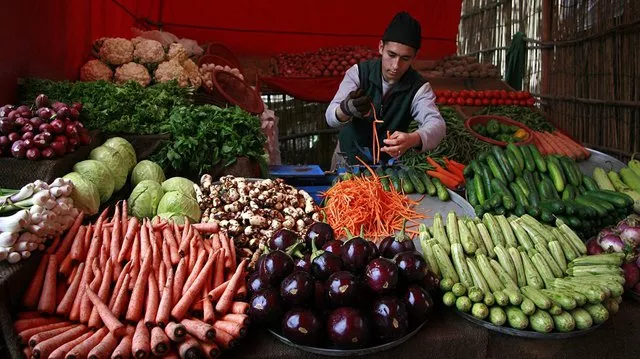 on an annual basis prices of gram whole potatoes besan pulses eggs cigarettes chicken and other essential items also increased photo reuters on an annual basis prices of gram whole potatoes besan pulses eggs cigarettes chicken and other essential items also increased photo reuters