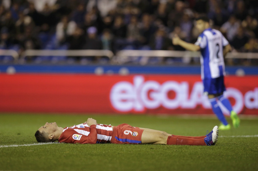 atletico striker knocked unconscious in 1 1 deportivo draw photo reuters