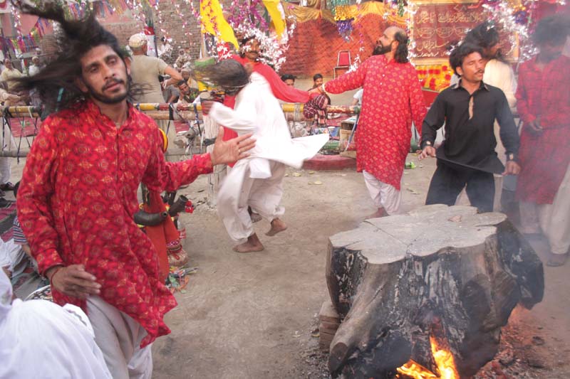 malangs performing dhamal at the urs photo abid nawaz express