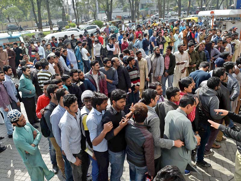 cricket fans queue up to buy tickets for the forthcoming psl final cricket match photo afp