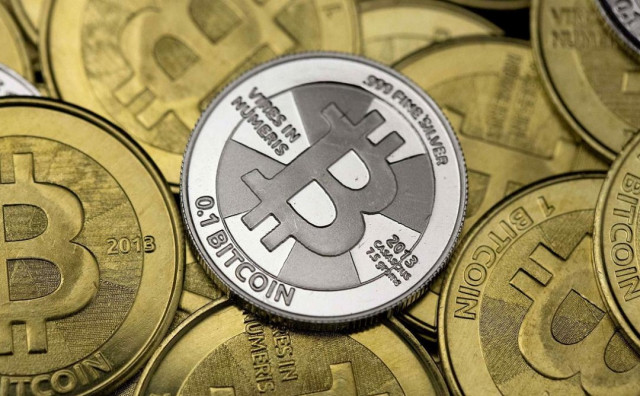 the digital currency climbed to a record high of 1 298 on the bitstamp platform photo reuters the digital currency climbed to a record high of 1 298 on the bitstamp platform photo reuters