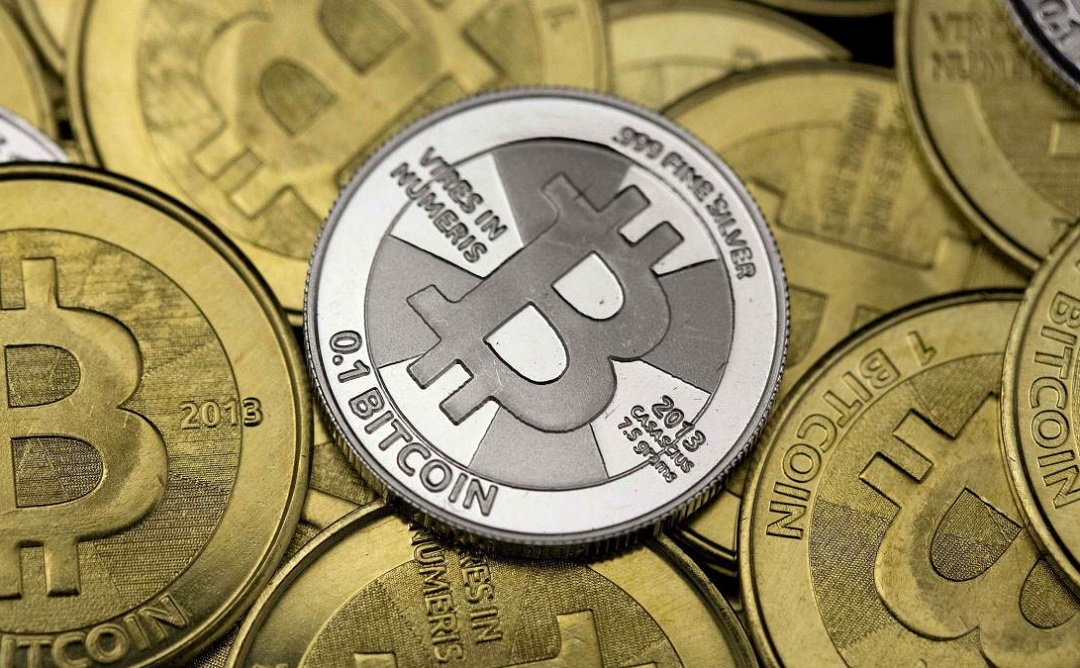 the digital currency climbed to a record high of 1 298 on the bitstamp platform photo reuters