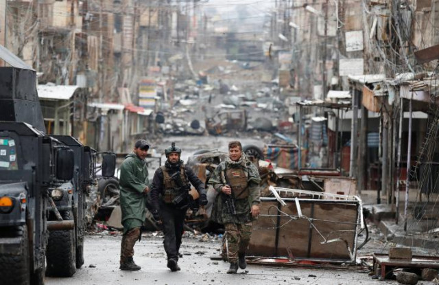 iraqi special forces soldiers walk in a street in mosul iraq march 4 2017 photo reuters iraqi special forces soldiers walk in a street in mosul iraq march 4 2017 photo reuters