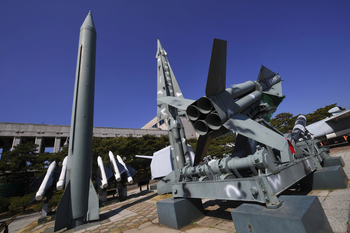 replicas of a north korean scud b missile left and south korean nike missiles right are displayed at the korean war memorial in seoul on march 6 2017 photo afp