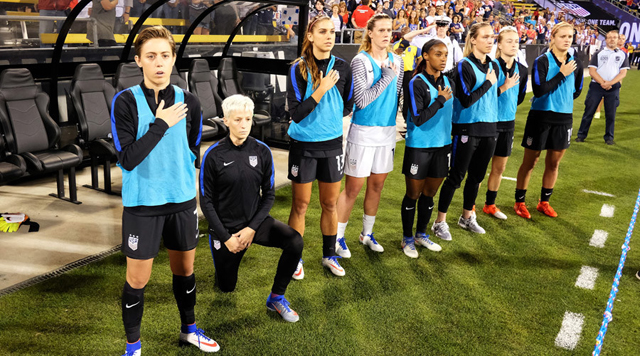 megan rapinoe kneels during the u s national anthem before a match against thailand photo afp