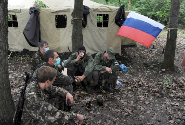 pro russian armed militants of a so called 039 eastern battalion 039 take part in military exercises in the forest near the eastern ukrainian city of donetsk photo afp pro russian armed militants of a so called 039 eastern battalion 039 take part in military exercises in the forest near the eastern ukrainian city of donetsk photo afp