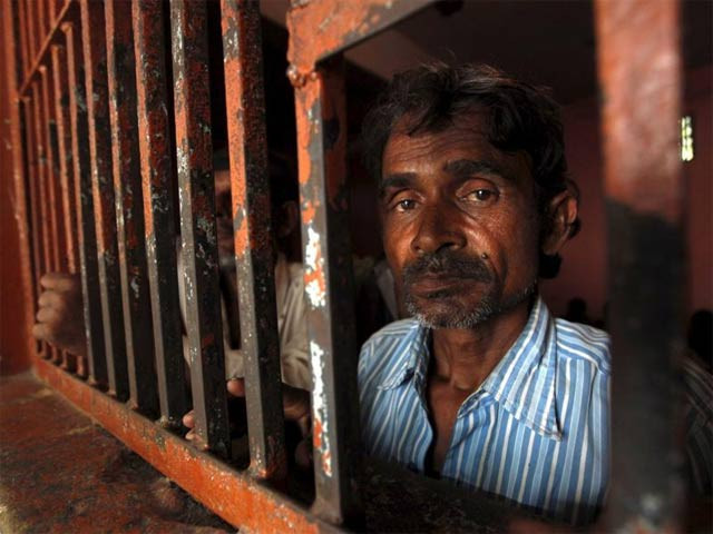 the fishermen were arrested on saturday evening and brought to a police station in karachi photo reuters the fishermen were arrested on saturday evening and brought to a police station in karachi photo reuters
