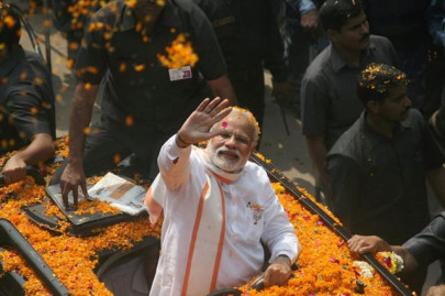 modi battles for hearts and minds in india s holy city