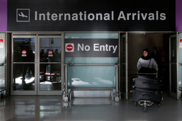 an international traveler arrives after us president donald trump s executive order travel ban photo reuters file an international traveler arrives after us president donald trump s executive order travel ban photo reuters file