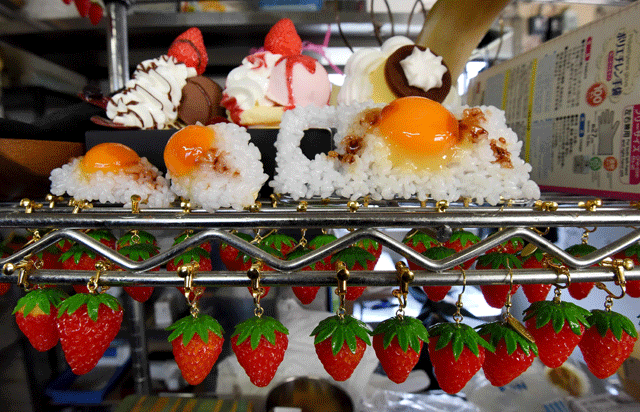 this picture taken on january 18 2017 shows plastic strawberry earrings made at the studio of fake food hatanaka in tokorozawa a suburb of tokyo photo afp