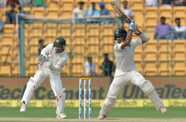 cheteshwar pujara punches off the back foot india v australia 2nd test bengaluru 3rd day march 6 2017 photo afp cheteshwar pujara punches off the back foot india v australia 2nd test bengaluru 3rd day march 6 2017 photo afp