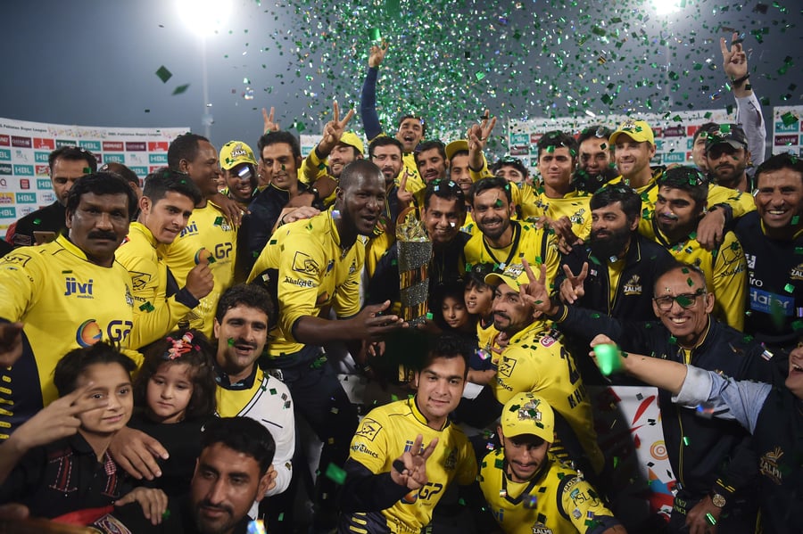 cricketers of peshawar zalmi their victory over quetta gladiators in the final cricket match of the pakistan super league psl at the gaddafi cricket stadium in lahore on march 5 2017 photo afp