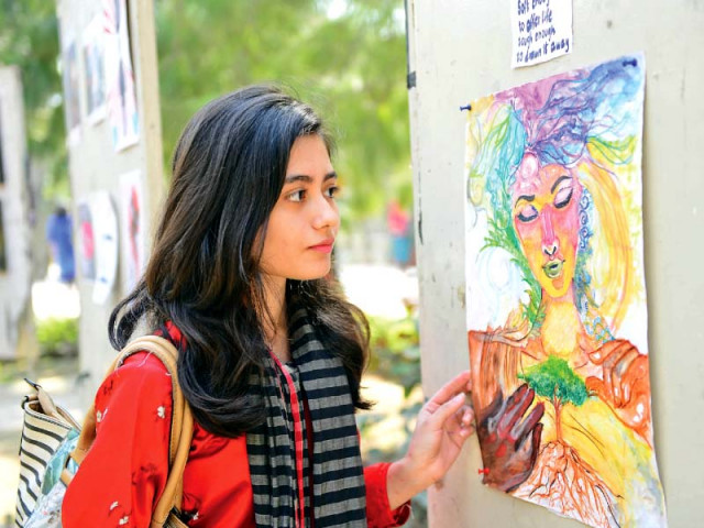 a woman at the fine arts exhibition at gcu photo express a woman at the fine arts exhibition at gcu photo express