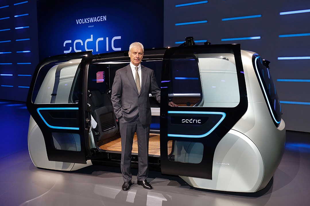 volkswagen group 039 s ceo matthias mueller posing with sedric the group 039 s first autonomous car prototypte unveiled on march 6 2017 on the eve of the geneva motor show photo afp