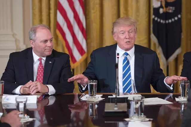 us president donald trump r speaks with us congressman and majority whip steve scalise l r louisiana during a meeting with the us house deputy whip team at the white house in washington dc march 7 2017 photo afp us president donald trump r speaks with us congressman and majority whip steve scalise l r louisiana during a meeting with the us house deputy whip team at the white house in washington dc march 7 2017 photo afp